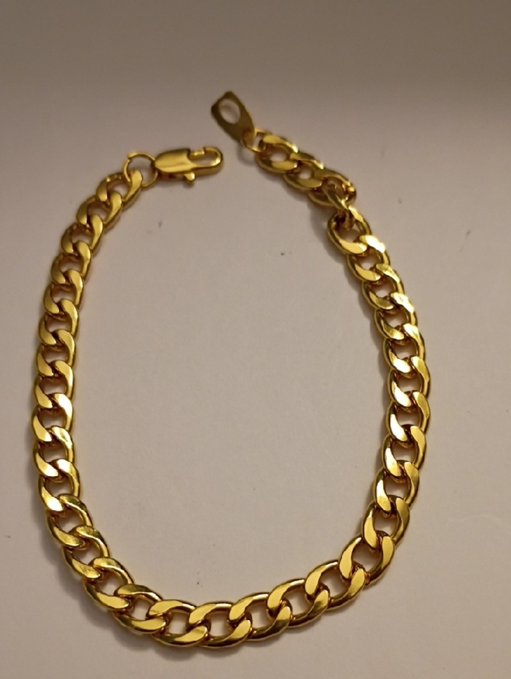 Gold Tone Curbed Chain Bracelet